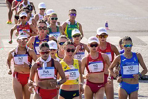 Athletes compete women's 20km race walk